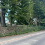 photo d'un terrain nu à Pau, commande de simulation de mur de délimitation pour dossier urbanisme (1)