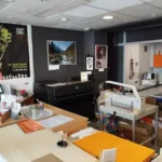 photo l'intérieur de la boutique de PAU Repro, atelier de reprographie et infographie